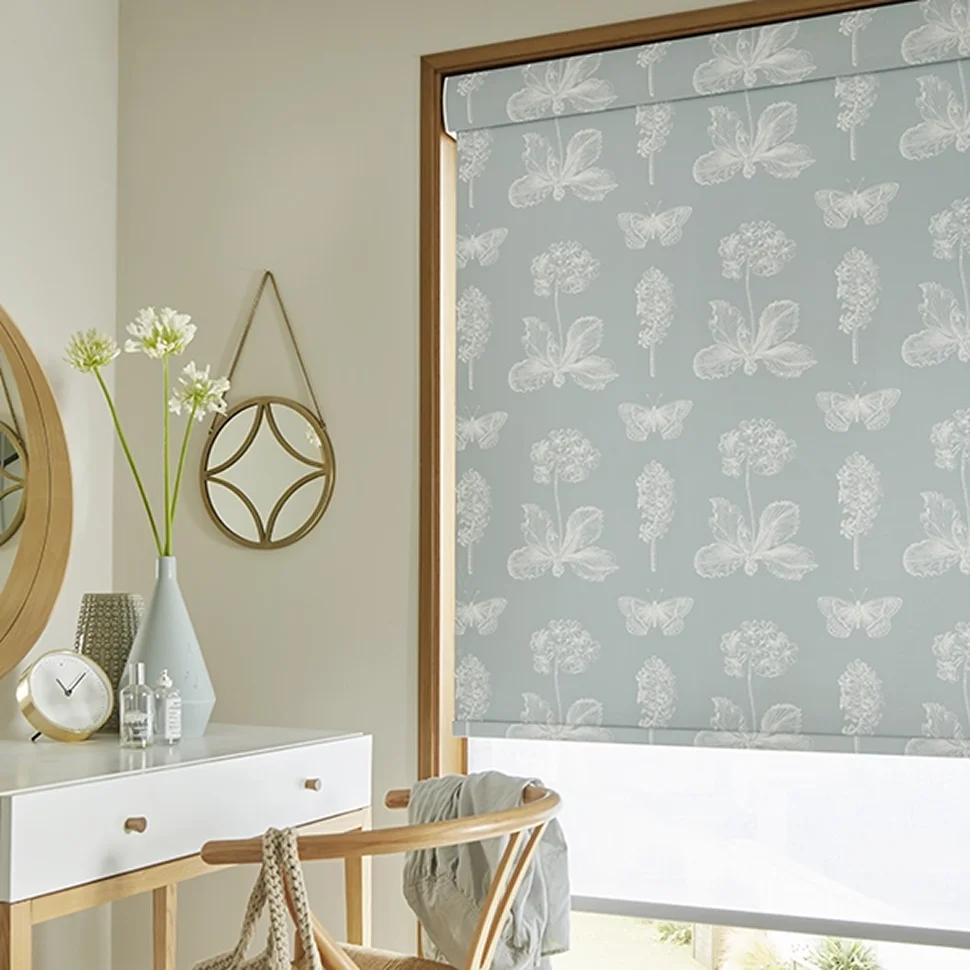 Modern roller blind in a bright window